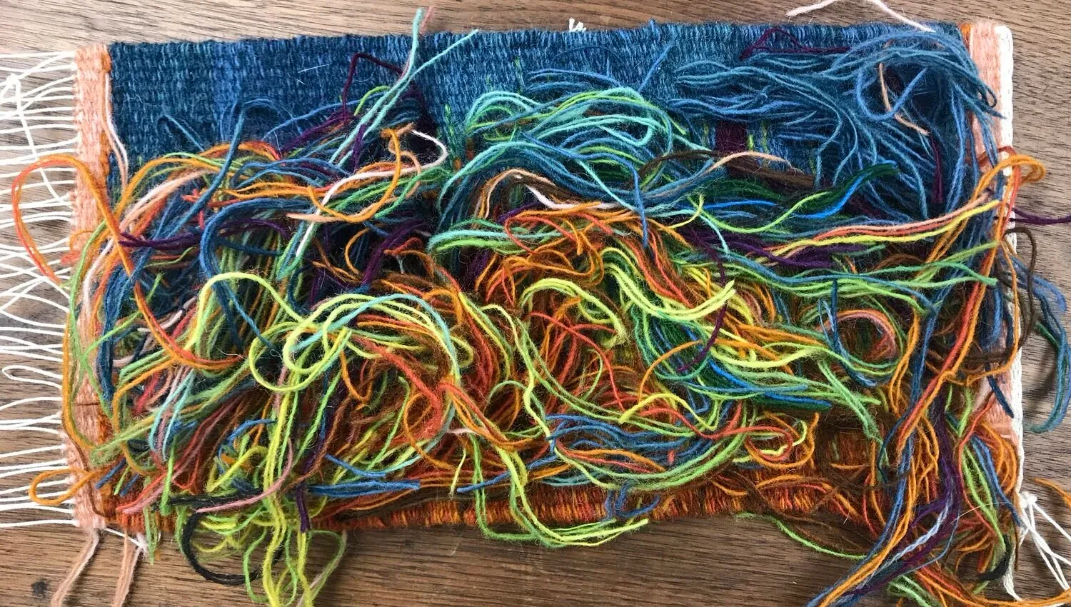 Back side of a tapestry - src: https://www.kennitatully.com/tapestry-journeys/on-finishing-tapestries